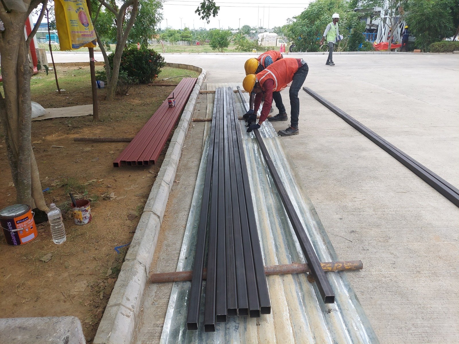 Industrial metal roofing installation for a factory building