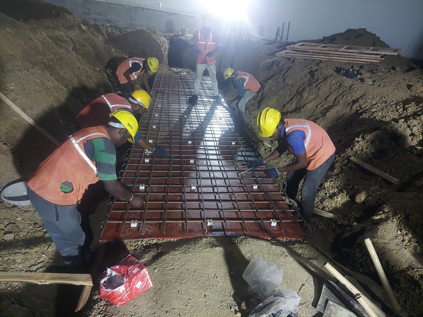 Rebar mesh and formwork installation for an industrial concrete slab