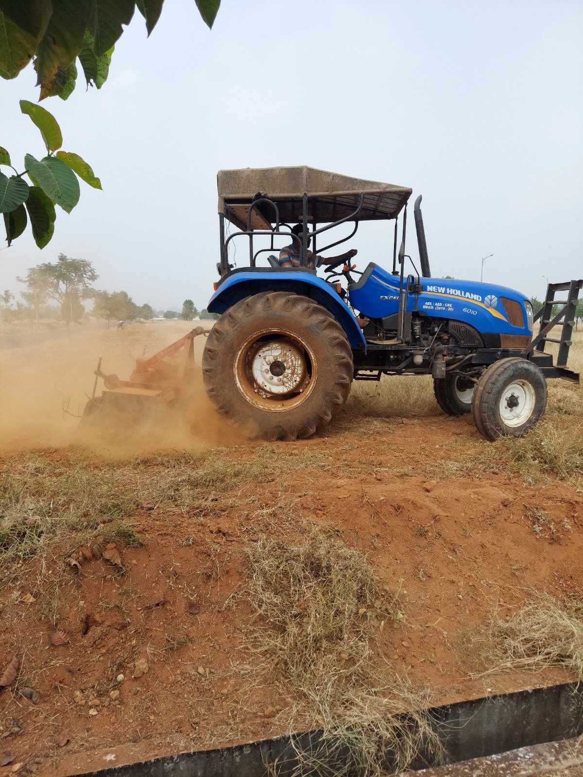 Soil preparation with a rotavator ahead of industrial civil works